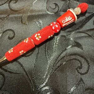 Coca Cola Red Beaded Pen with White Floral and Star Accents